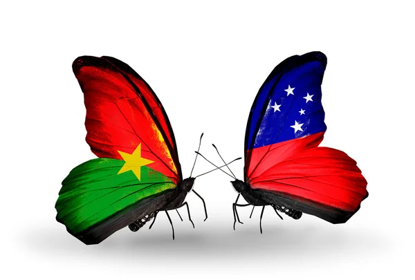 Dwa motyle z flagami — Zdjęcie stockowe