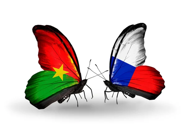 Two butterflies with flags on wings — Stock Photo, Image