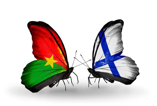 Two butterflies with flags on wings — Stock Photo, Image