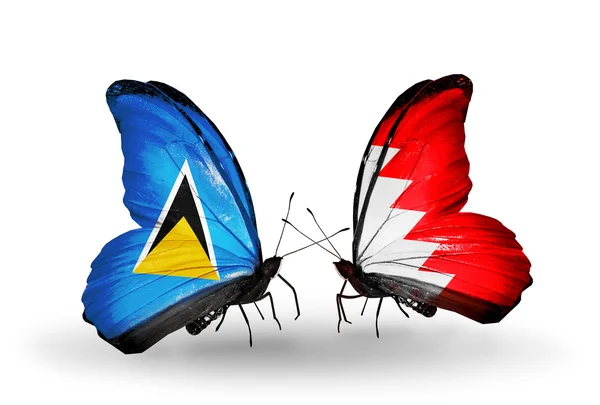 Two butterflies with flags on wings — Stock Photo, Image