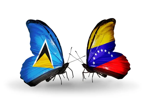 Två fjärilar med flaggor på vingar — Stockfoto