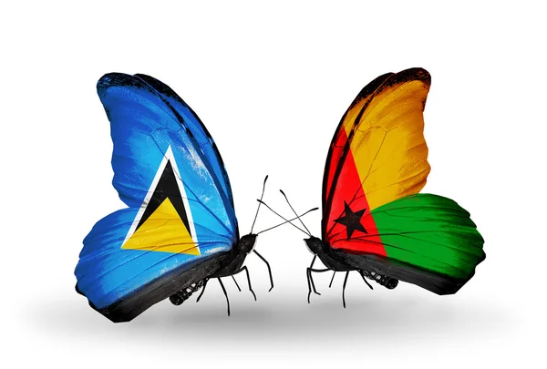 Two butterflies with flags on wings — Stock Photo, Image