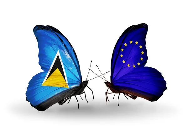 Dwa motyle z flagami na skrzydłach — Zdjęcie stockowe