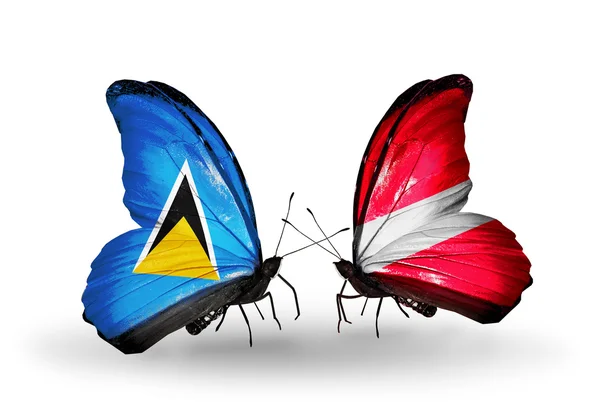 Two butterflies with flags on wings — Stock Photo, Image