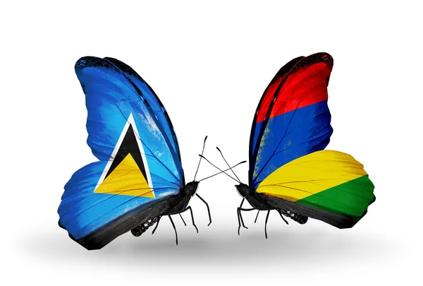 Dos mariposas con banderas en las alas — Foto de Stock