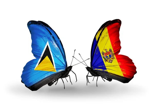 Dwa motyle z flagami na skrzydłach — Zdjęcie stockowe