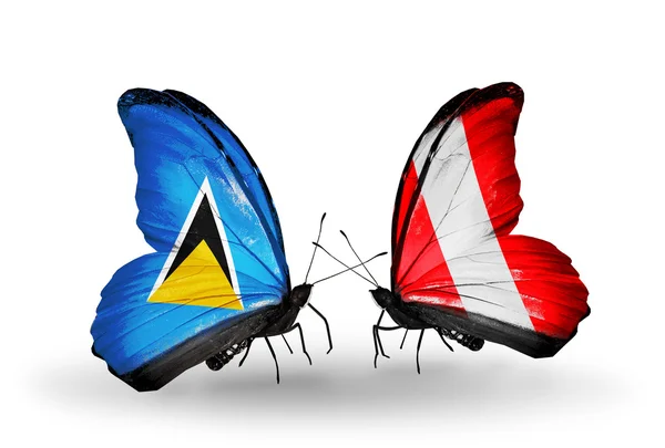 İki kelebek kanatları üzerinde bayraklı — Stok fotoğraf