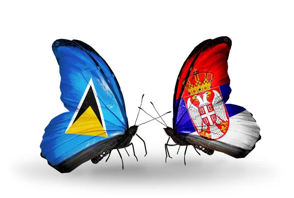 Butterflies with flags on wings — Stock Photo, Image