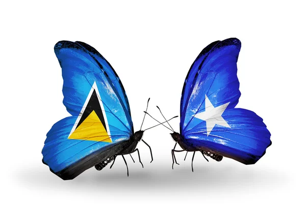 Butterflies with flags on wings — Stock Photo, Image