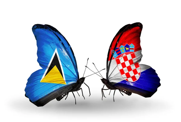 Butterflies with flags on wings — Stock Photo, Image