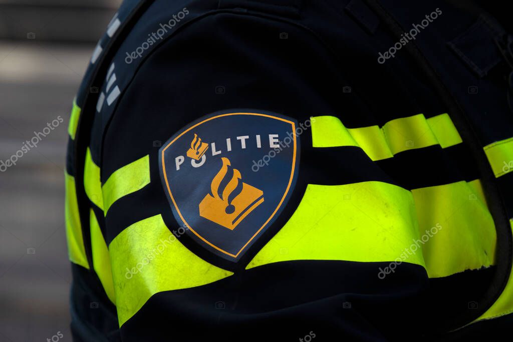 Close Up Police Logo At Amsterdam The Netherlands 4-5-2020