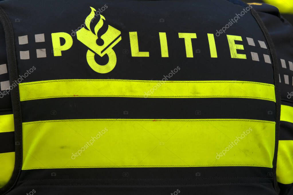 Backside Of A Police Man At Amsterdam The Netherlands 4-5-2020