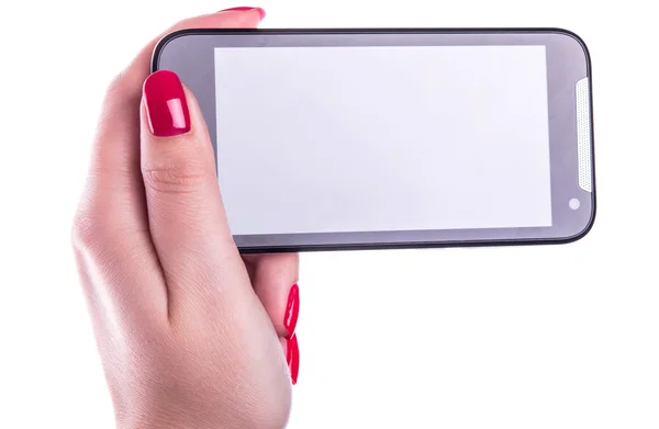 Teléfono celular con pantalla táctil en mano femenina con uñas de manicura francesas sobre fondo blanco —  Fotos de Stock