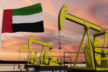 Gün batımında Birleşik Arap Emirlikleri bayrağıyla hava bulutlu ve güzel..