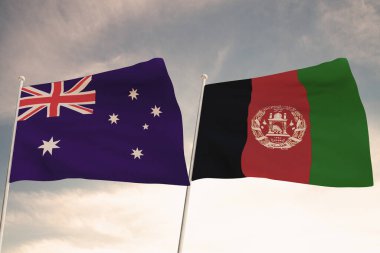 Afganistan ve Avustralya 'nın bayrakları bulutlu mavi gökyüzü arkaplanıyla dalgalanıyor..