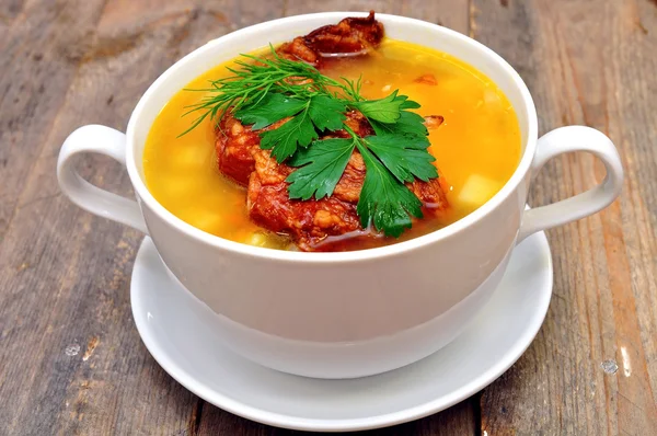 Pea soup with smoked pork ribs — Stock Photo, Image