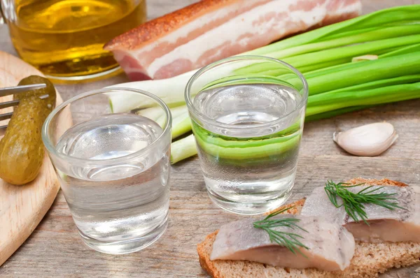 Two glasses of vodka and a snack — Stock Image Two glasses of vodka and a snack Stock Image