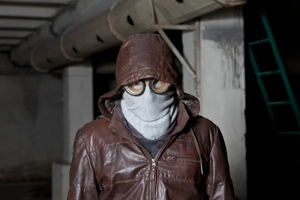 Guy in mask and safety glasses hooded jacket — Stock Photo, Image