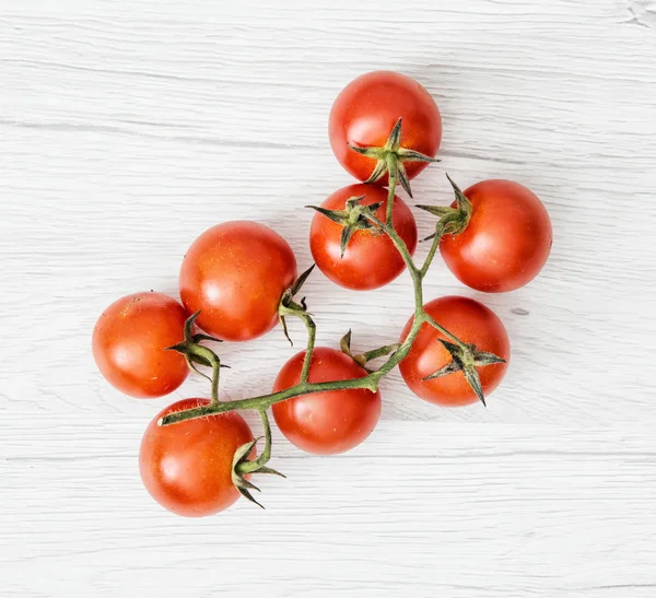 Kiraz domates ahşap arka plan üzerinde detay fotoğraf — Stok fotoğraf