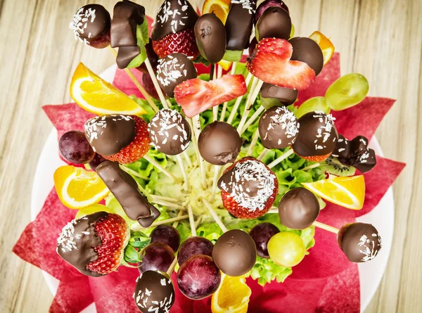 Fruit bouquet with chocolate frosting, special gift — Stock Photo, Image