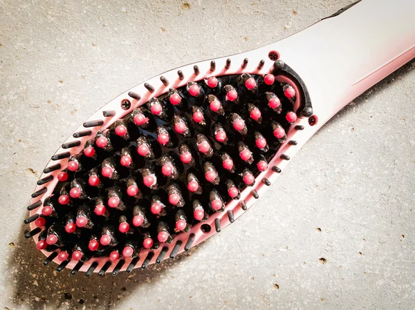 Close up de escova de cabelo feminino — Fotografia de Stock