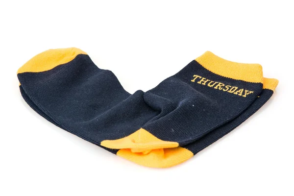 Isolated wool socks with inscription THURSDAY — Stock Photo, Image
