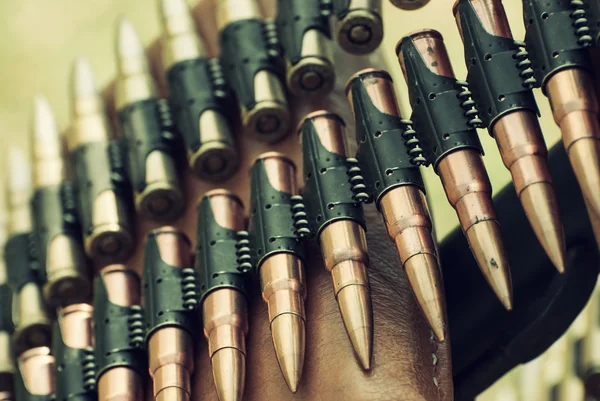 Bullets in ammunition belt for machine gun — Stock Photo, Image