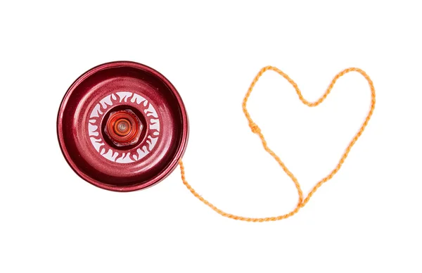Kırmızı yoyo ile kalp şeklinde sicim — Stok fotoğraf