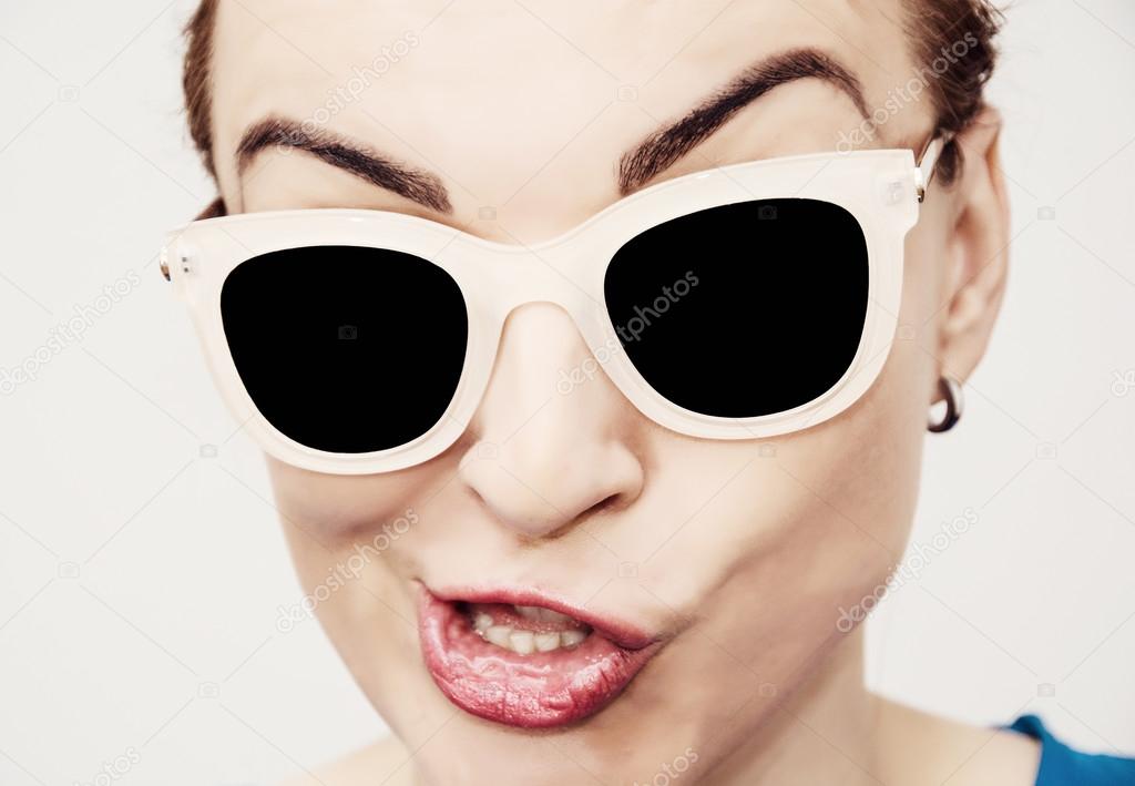 Crazy caucasian glamour woman with stylish sunglasses