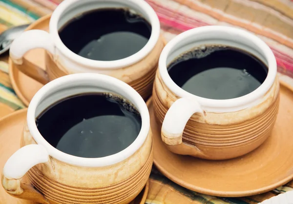 Drie keramische koppen koffie — Stockfoto