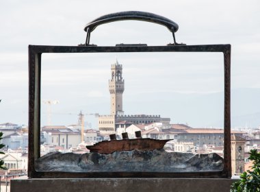 View of the Palazzo Vecchio through the metal frame with the boa clipart