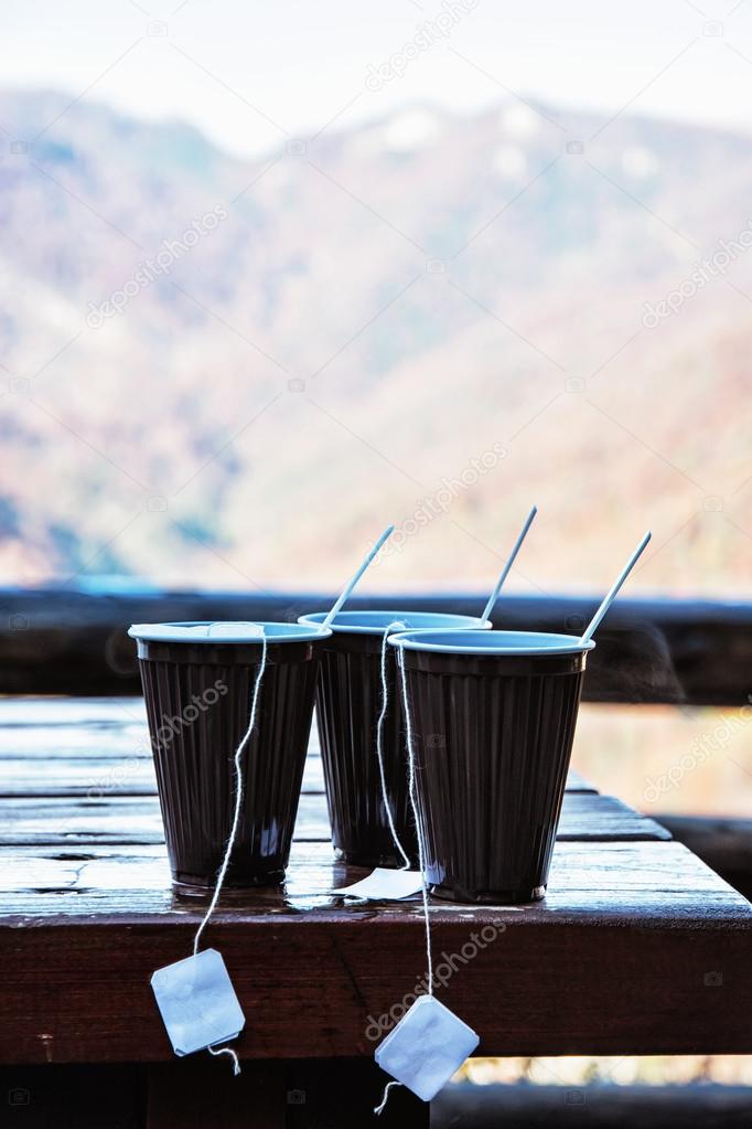 View of the mountain with hot tea refreshment