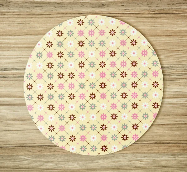 Abstract pattern themed round tray on the wooden background — Stock Photo, Image