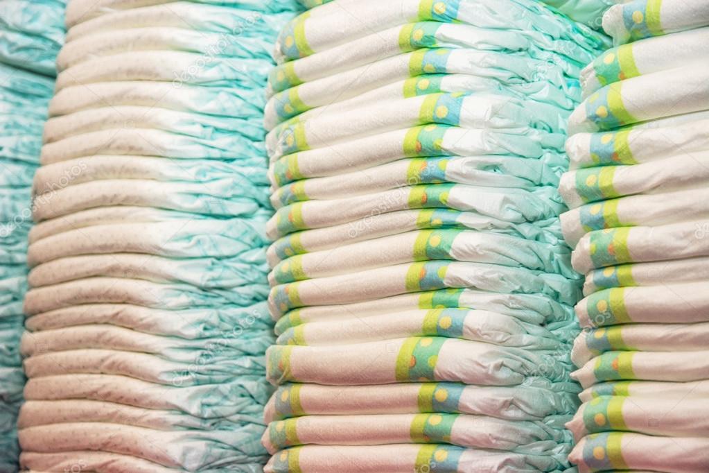 Children's diapers stacked in a piles in the child room