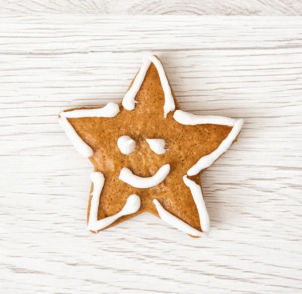 Tasty gingerbread star face, Christmas symbol — Stock Photo, Image