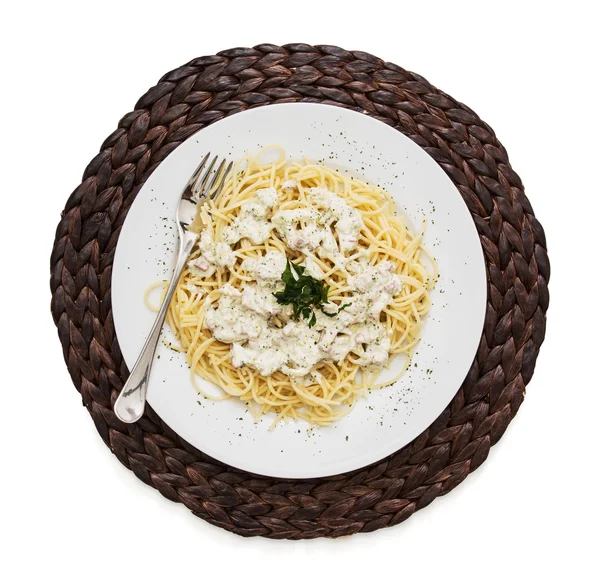 One portion of tasty spaghetti on the wicker tray — Stock Photo, Image