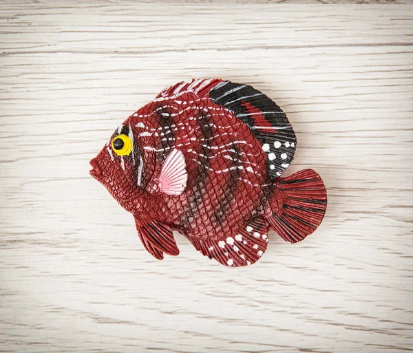 Röd plast fisk leksak — Stockfoto