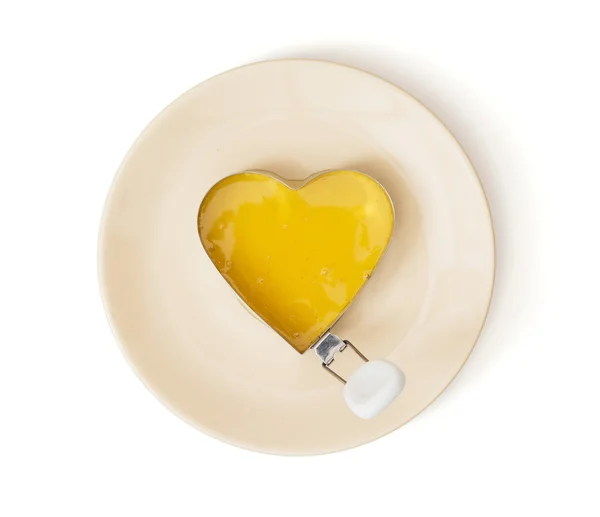 Med do formy na pečení ve tvaru srdce na desku, Valentin — Stock fotografie