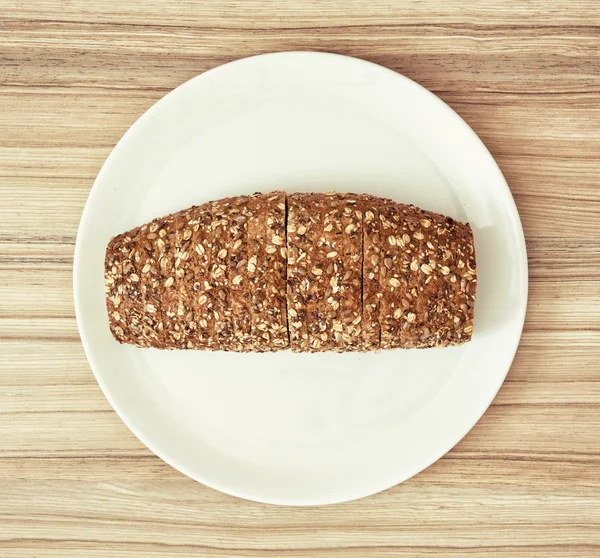 Sliced healthy multigrain bread, food theme — Stock Photo, Image