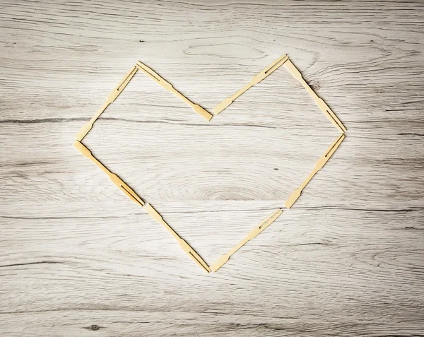 Valentine heart of toothpicks, symbol of love — Stock Photo, Image