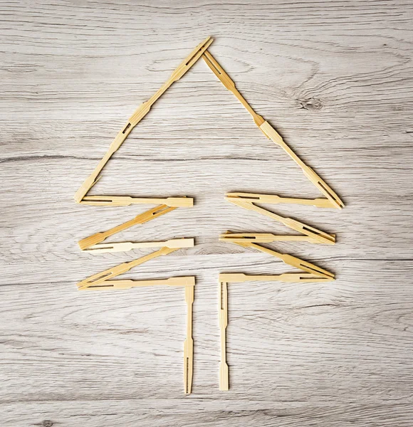 Coniferous tree of toothpicks on the wooden background — Stock Photo, Image