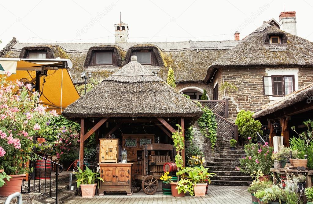 Garden restaurant with thatch in hungarian village, tourist dest