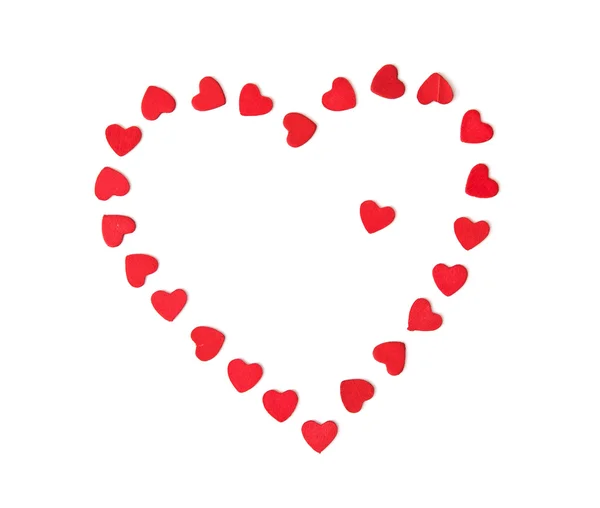 Сердце Валентина из маленьких красных сердец на белом бэкгро — стоковое фото