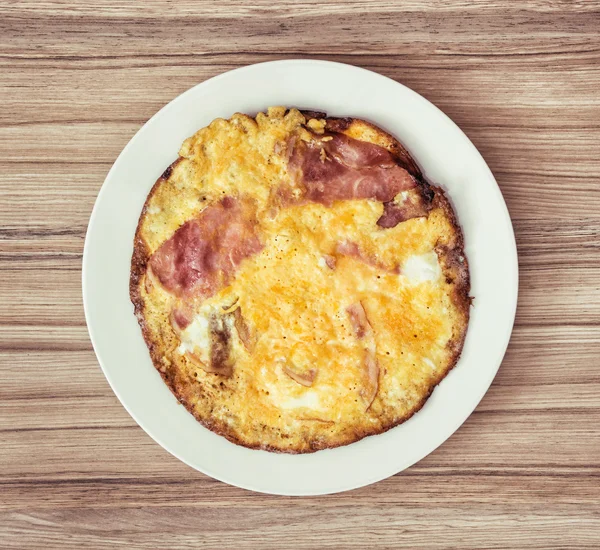 Big portion of tasty ham and eggs on the white plate — Stock Photo, Image