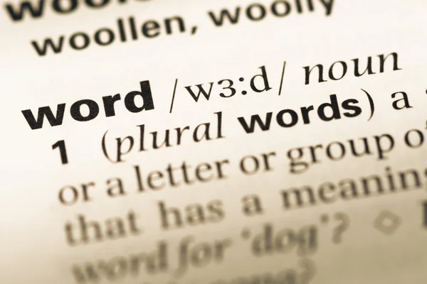 Close up of old English dictionary page with word word — Stock Photo, Image