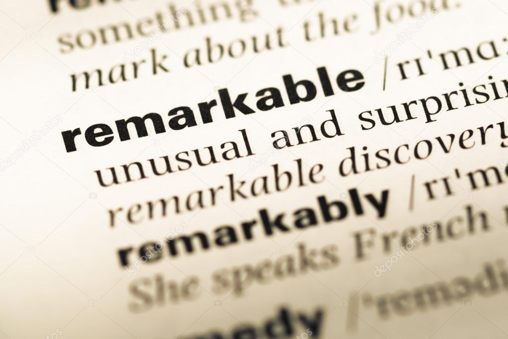 Close up of old English dictionary page with word remarkable — Stock