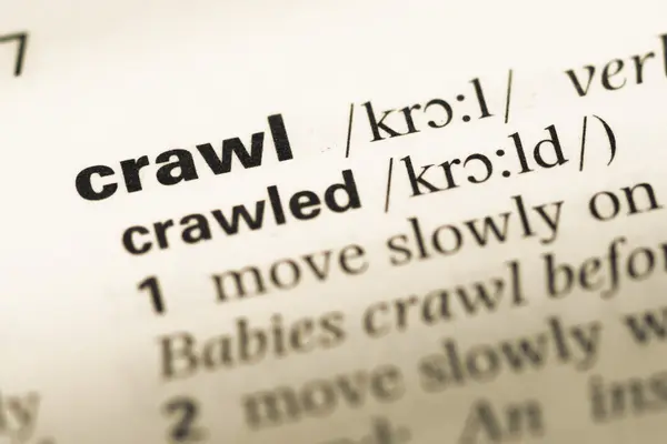 Close up of old English dictionary page with word crawl — Stock Photo, Image