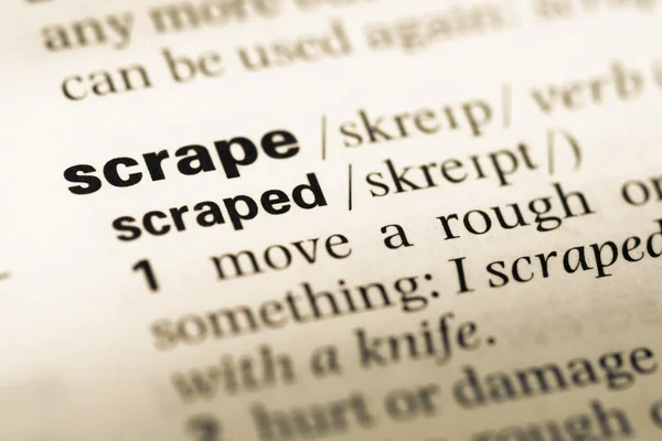 Close up of old English dictionary page with word scrape — Stock Photo, Image