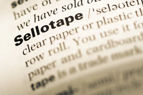단어 sellotape와 오래 된 영어 사전 페이지 닫습니다 — 스톡 사진