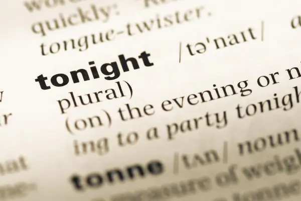 Close up of old English dictionary page with word tonight — Stock Photo, Image
